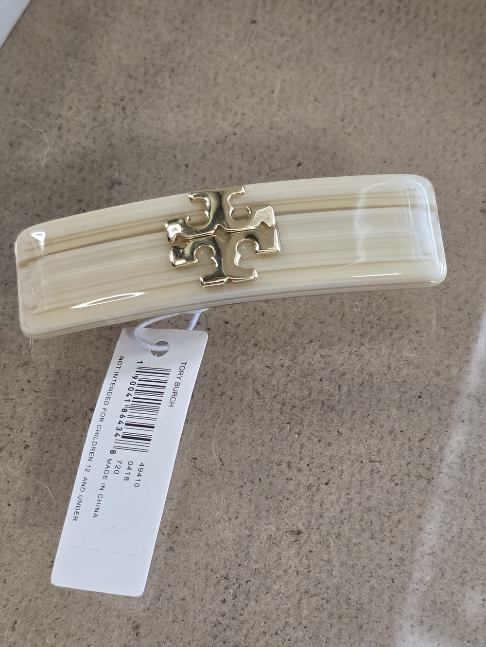 Tory Burch Marbled Cream Resin Barrette with Gold Logo
